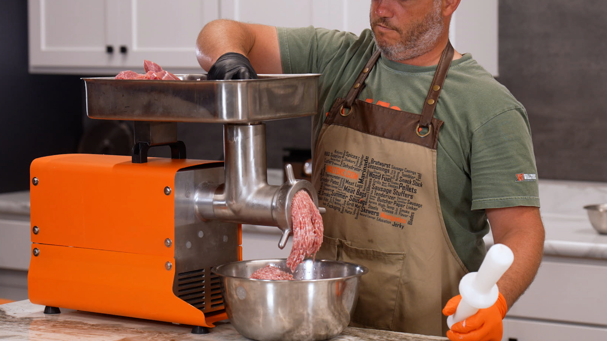 Walton's Meat Grinder meat being ground with Walton's meat grinder